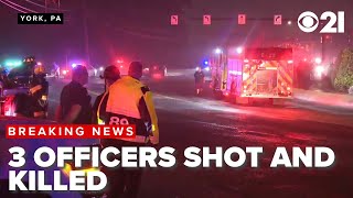 Three officers shot dead  two wounded while serving a warrant