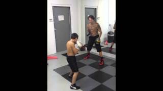 Litos doing mitt works with Paul Spadafora