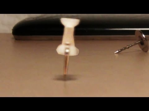 📌 Using a pushpin / thumbtack as a top * fun party trick  #shorts
