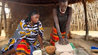 Raw Authentic African Village life in  a prolongec season without rain . //cooking