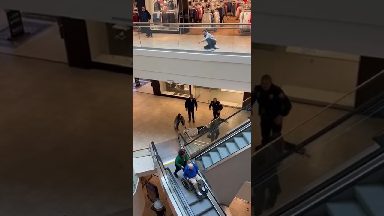 Погоня на эскалаторе с участием неуправляемого инвалидного кресла, падающего сверху манекена.