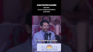 Juan Carlos, Member, House of Representatives, Columbia speaks about Gurudev