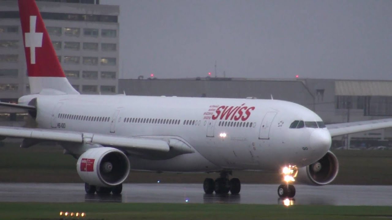 POWERFUL AWESOME JET BLAST TAKEOFF SWISS AIR AIRBUS 330 DISAPPEARS INTO THE CLOUDS