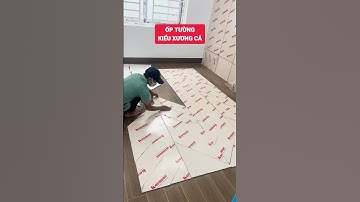 Ốp tường kiểu xương cá với tấm ốp than tre vân vải hiện đại