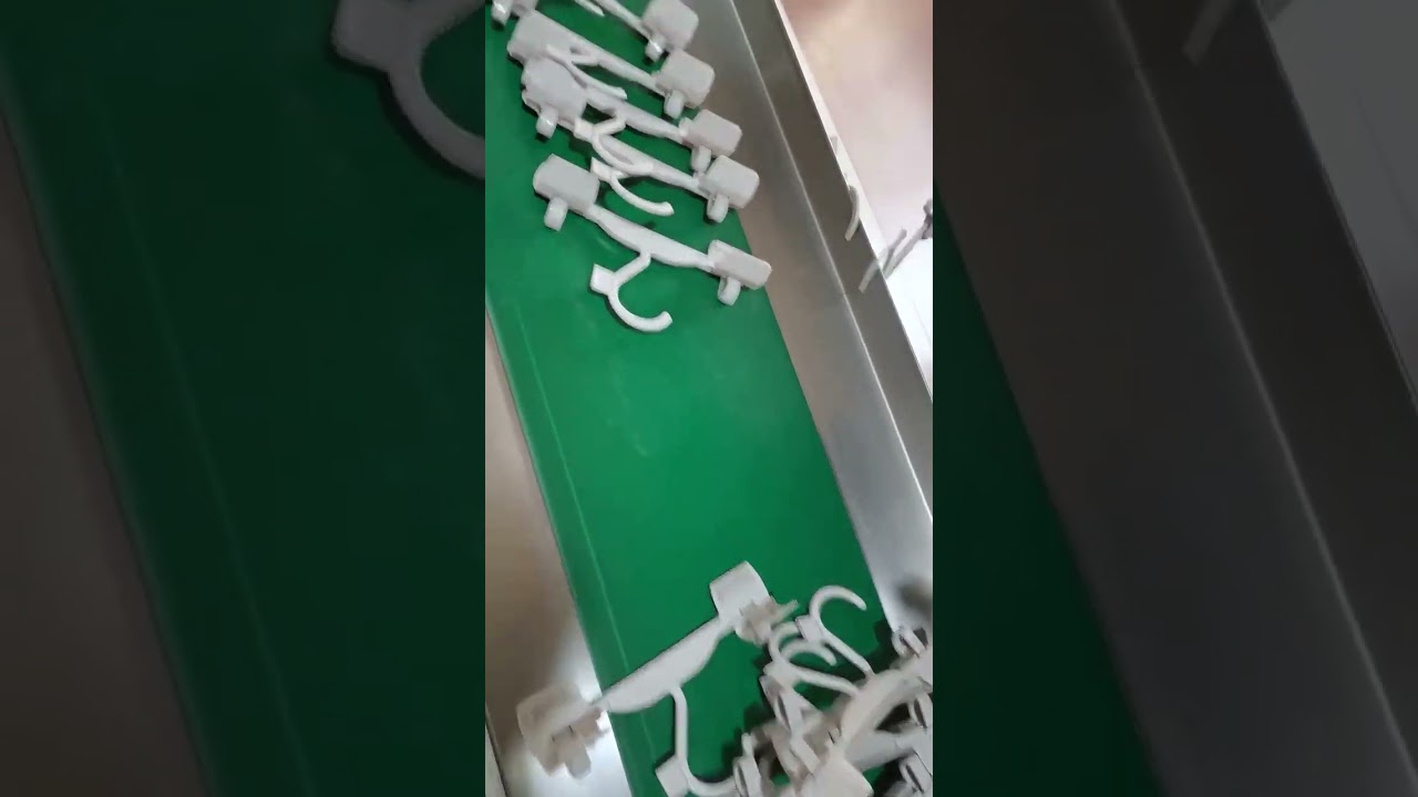 Trouser hanger automatic assembly machine with output of 20 per minute