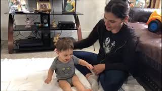 How to help your baby sit up from lying on back position Video