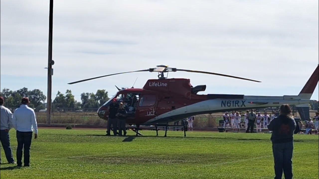 Flight for Life Delivers the Game Ball at the Headly