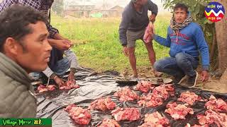 .  pork cutting and weighting Traditional style in the Nepali village