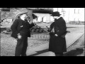 Vladimir Lenin talks to his secretary Vladimir Bonch-Bruevich besides large canno...HD Stock Footage