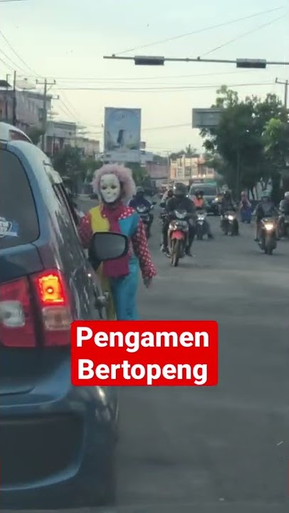 Pengamen Bertopeng