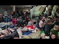 Kyiv residents take shelter inside metro station during massive Russian attack | AFP