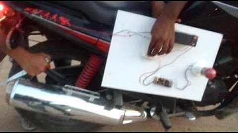 Electric Power Generation By using two wheeler silencer