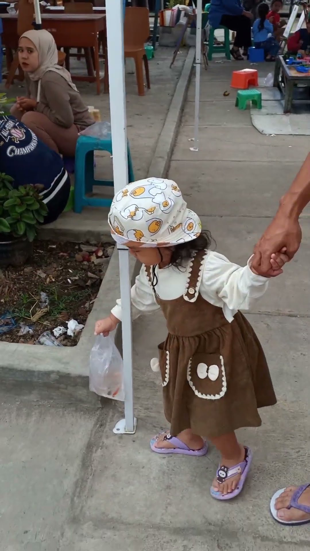 Toddler Carefully Moves Fish Around A Pole || ViralHog