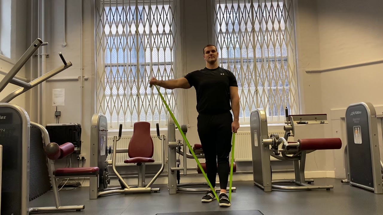 Single arm lateral shoulder raise with resistance band YouTube