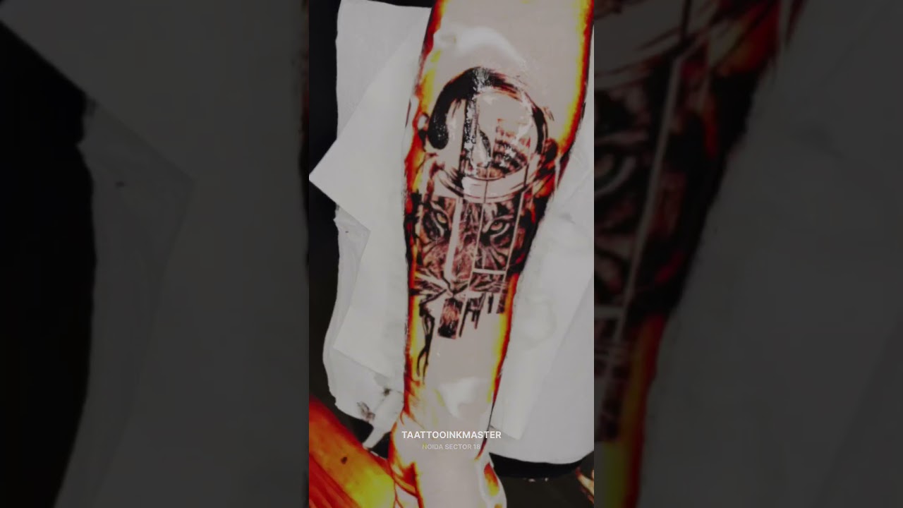 tiger tattoo is a perfect blend of power and precision. at 