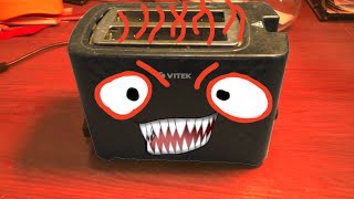 The Vitek vt-1586 toaster three years later. The leather bag population is now under control.