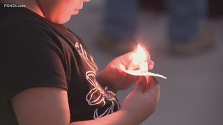 Advocates and supporters attend domestic violence vigil in Torrington