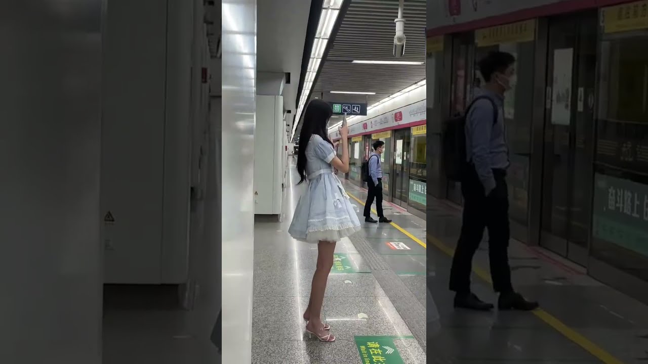 Chinese tall girl wearing lolita costume and high heels in subway！