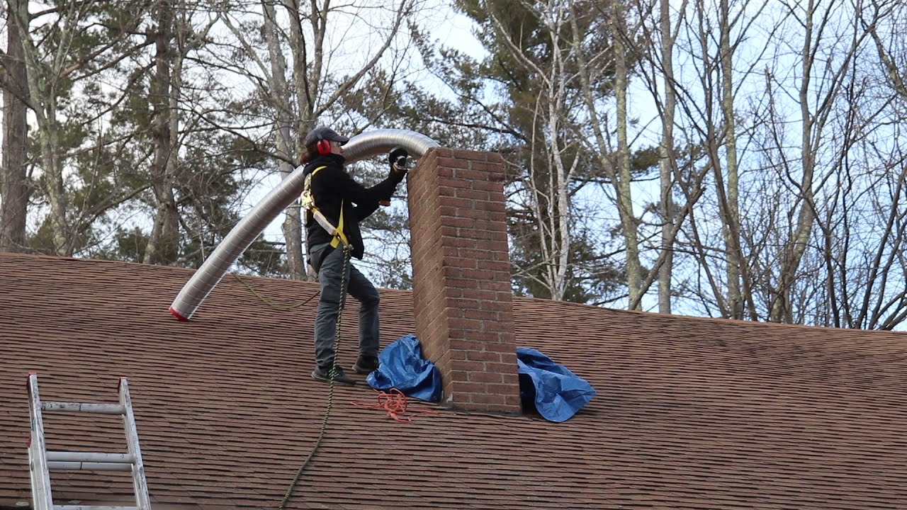 Installing a stainless steel chimney liner - YouTube
