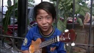 Fahrizal pengamen cilik