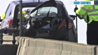 Woman dies after manhole cover strikes windshield