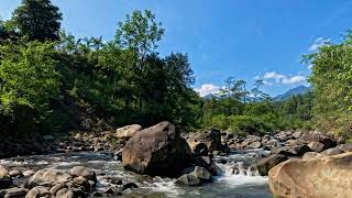 Tranquil River Under Clear Blue Skies | Slow Flowing River in Morning Sunshine by BCSB