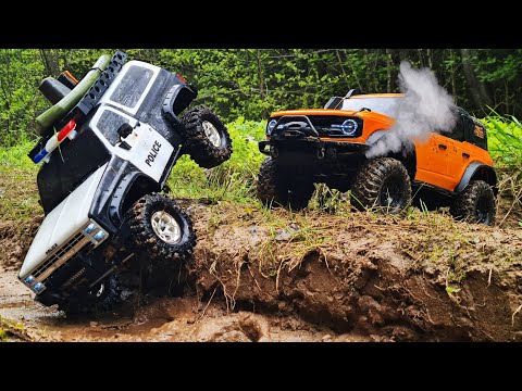 Видео: ЗАДЫМИЛ FORD Bronco! ... Бюджетная Белуга Huangbo R1001 против Blazer от Gmade ... RC OFFroad 4x4