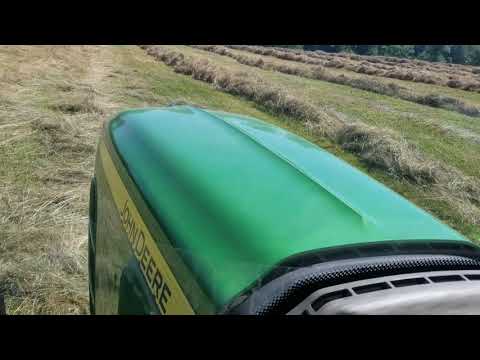 Raking hay in