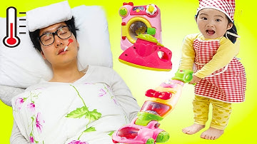 Boram help her father with kitchen toys