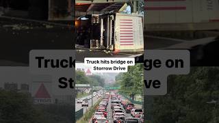There was traffic delays after a truck rolled over and and hit an overpass bridge on Storrow Drive.