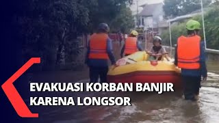 Proses Evakuasi Korban Banjir Karena  Kali Jantung Tertimbun Longsor