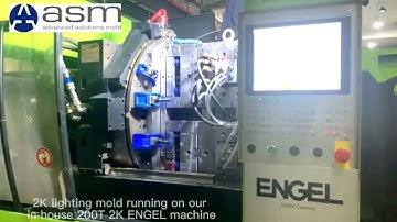 Automotive lighting 2K injection molding / 2K mold running on our in-house 200T 2K ENGEL machine