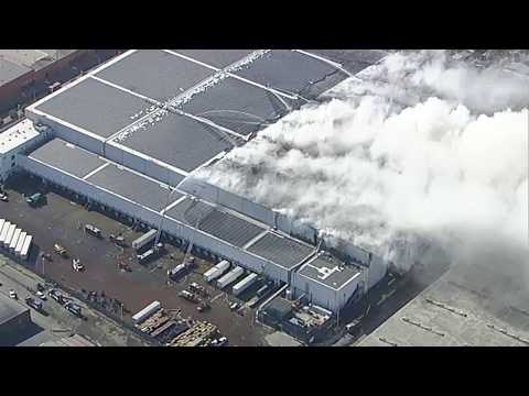 Warehouse fire continues to burn in Boyle Heights