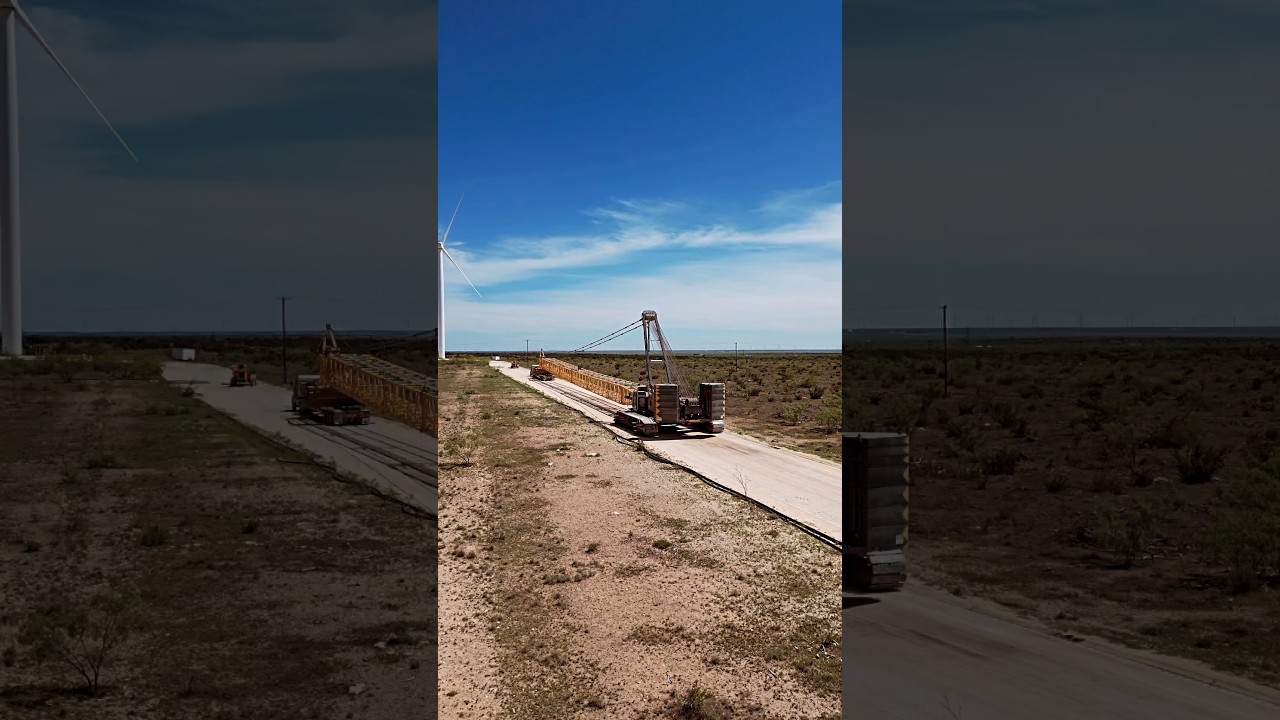 Moving 500 ton crawler crane with help of truck boom down 