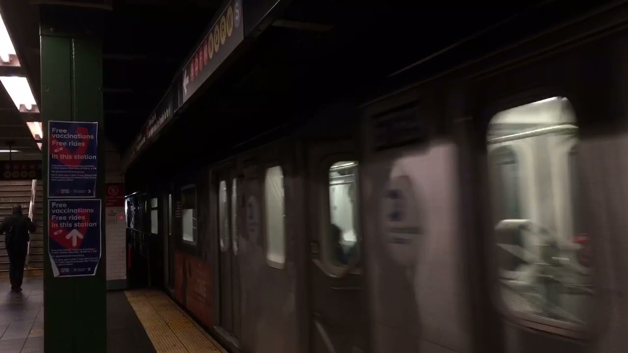 Utica Avenue bound (5) train via 7th Avenue arrives at Times Square - 42nd Street