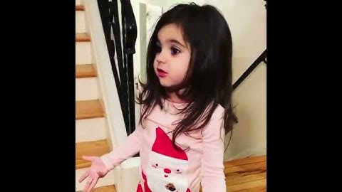 Italian kid having a conversation with her Nonno