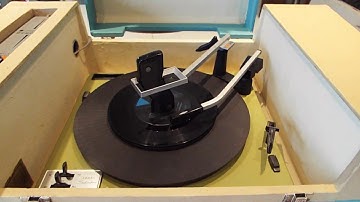 Silvertone 4 speed automatic STEREO record player playing a stack of 45