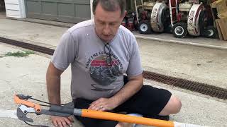 Fiskar Tree Trimmer Pole Saw hack to fix extension pole buttons slip