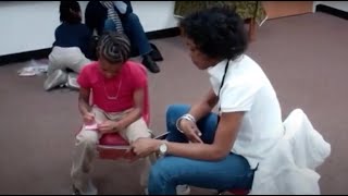 Lead to Read KC Reading Mentors at Derek Thomas Academy. Video by Lynn Rundle.