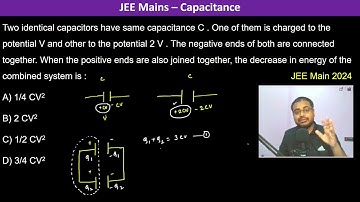Two identical capacitors have same capacitance C . One of them is charged to the potential V and