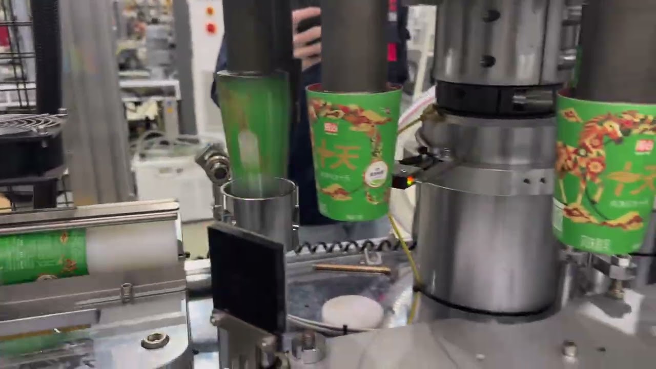 Plastic wrapping machine with hot melt glue 