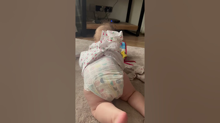 How I tie up my babies dress so it doesn’t get in the way when crawling 🤣 #shorts #baby #shortsclip