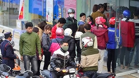 ATM, phòng giao dịch ngân hàng vẫn quá tải ngày cận Tết