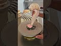 Heat up your icing spatula to achieve a sideways