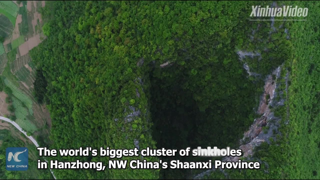 tv kanalları Aerial view of world's biggest cluster of sinkholes in NW China
