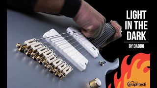 Light In The Dark
This video showcases a customized Ibanez RGDMS8-CSM multi-scale guitar featuring Graph Tech upgrades: PS-8000-00 white TUSQ saddles (custom 8-string set) and a Graph Tech nut custom-made from PT-4025-00 Black TUSQ XL blank.
Fun facts:
Daddo uses a unique tuning called High A on his 8-string guitars. Unlike traditional 8-string tuning (two extra lower strings), this tuning features one lower string (typically the low B) and one higher string above the regular high E the high A string.
In Daddos final solo run, during which he demonstrates an A-dominant 7 arpeggio, he starts from the lowest possible note (drop A in this song) and ends with a C# note on the fretted Fishman Fluence neck pickup, which is the highest possible pitch on this modified Ibanez RGDMS8-CSM multi-scale 8-string guitar.
This is a solo section from Light in the Dark by Daddos band, “Oversoul Frequency”, which is available on various digital platforms such as Spotify and Apple Music, and as a video HERE
Gear:
- Custom modified Ibanez RGDMS8-CSM multi-scale guitar (27.1” – 25.5”) with the “high A” tuning and scalloped neck
- Pickups: Fishman Fluence Modern
- Graph Tech PS-8000-00 white TUSQ saddles (8-string set)
- Graph Tech nut made from PT-4025-00 Black TUSQ XL blank
- Friedman IR-X preamp for the solo section
- Bogren Digital “AmpKnob BDH 5169” plugin with Bogren Digital IR for the rhythm guitars
- Bogren Digital “BassKnob STD” plugin for the bass sound
- Drums played by Kosta Delitheos
- All other instruments played and composed by Daddo
- GuitarFethish custom volume knob
- Professional installation of Graph Tech parts: Adam @Mada Guitars
Feel free to post any Graph Tech product questions in the comment section below.
Graph Tech website:
www.graphtech.com/
Daddo’s Facebook page: https://www.facebook.com/ddoreskovich/ Light In The Dark
