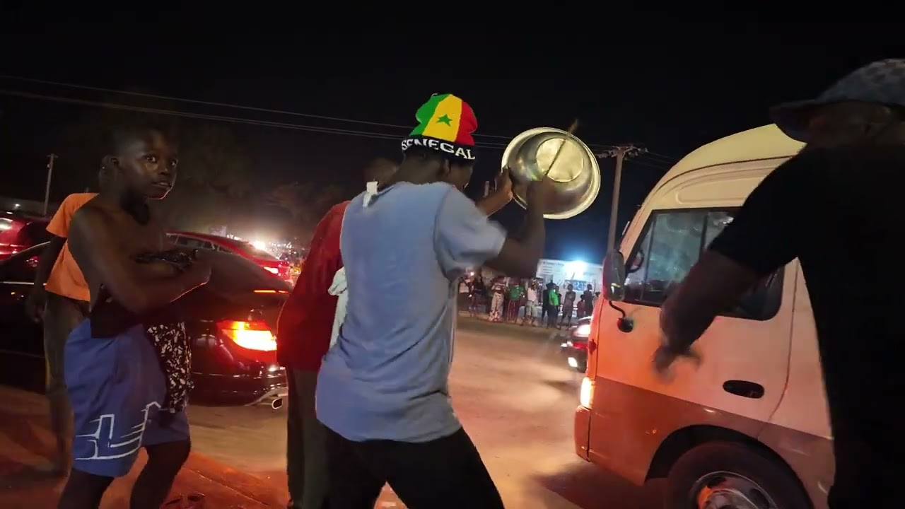 Senegal football celebrations in The Gambia as fans party