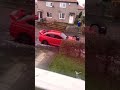 Subaru receiving safe wash in fast motion.￼