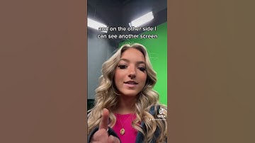 How do meteorologists know where to point on the green screen?