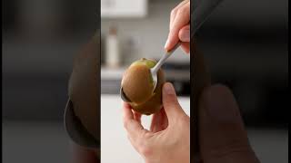 Peel a kiwi in one smooth motion using a spoon #Shorts